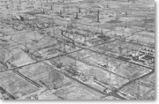 View of Dominguez Hill covered with oil derricks, looking southeast to Signal Hill, 1941